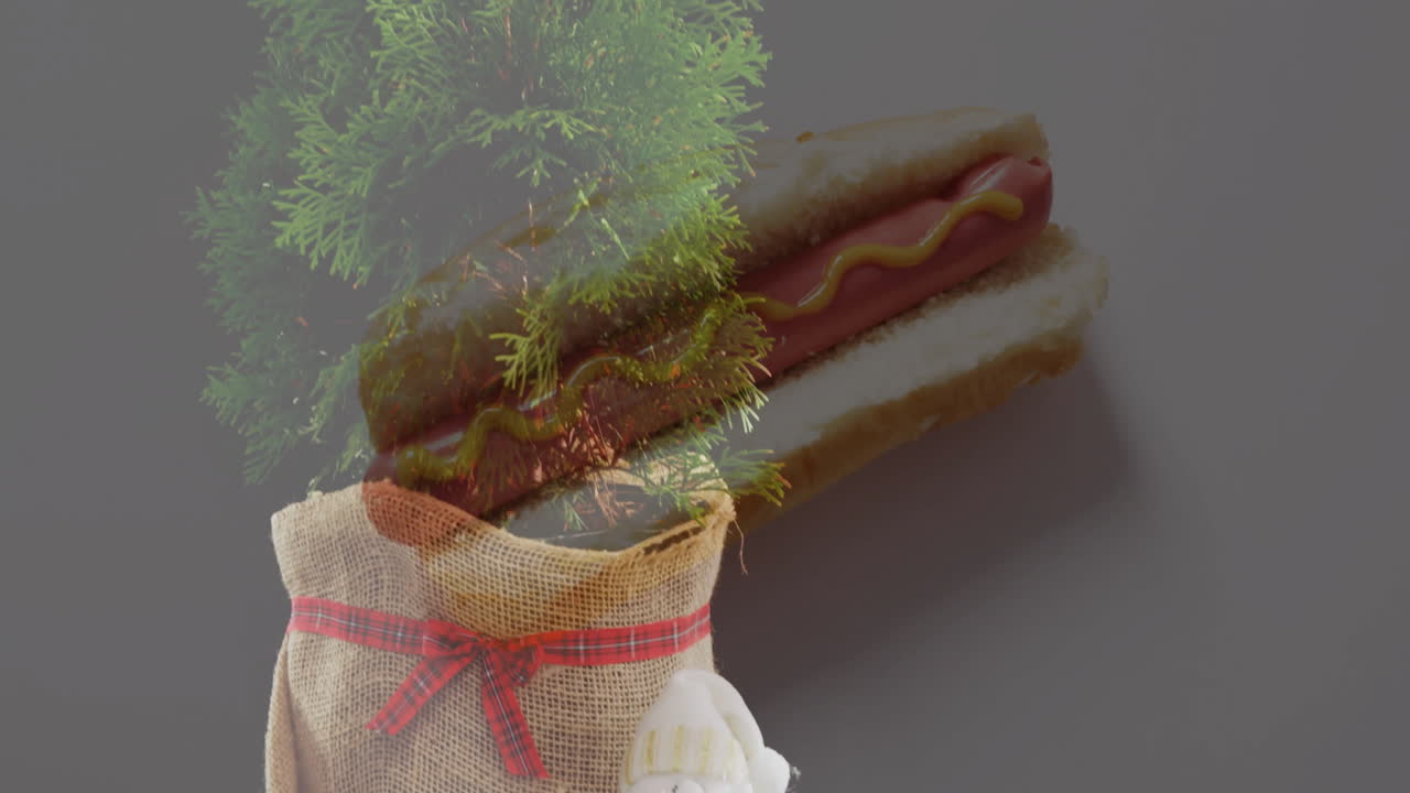 Christmas tree in burlap sack with hot dog and mustard overlay animation