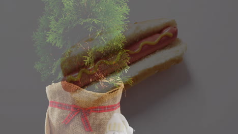 christmas tree in burlap sack with hot dog and mustard overlay animation
