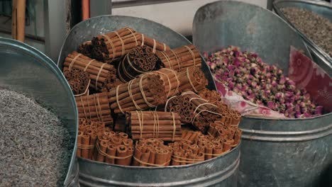 cinnamon sticks and other spices in a market