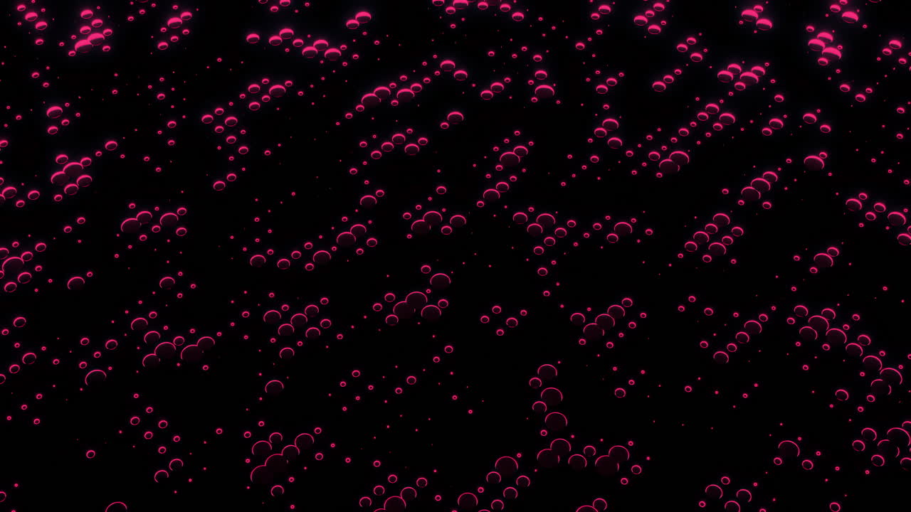 Bolle rosa luminose astratte su sfondo nero