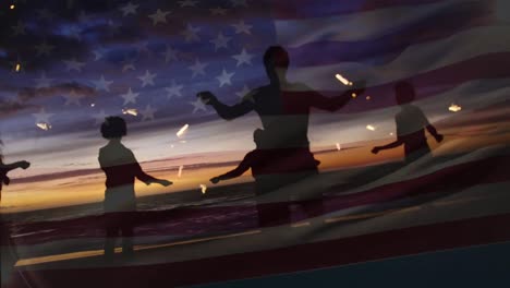 animation of flag of england over person typing on beach