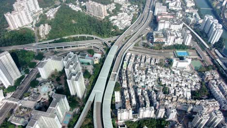 downtown hong kong city skyscrapers and urban traffic, aerial view