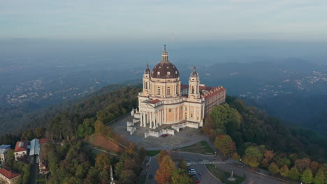 aerial view turning around of superga basilica at sunset turin italy