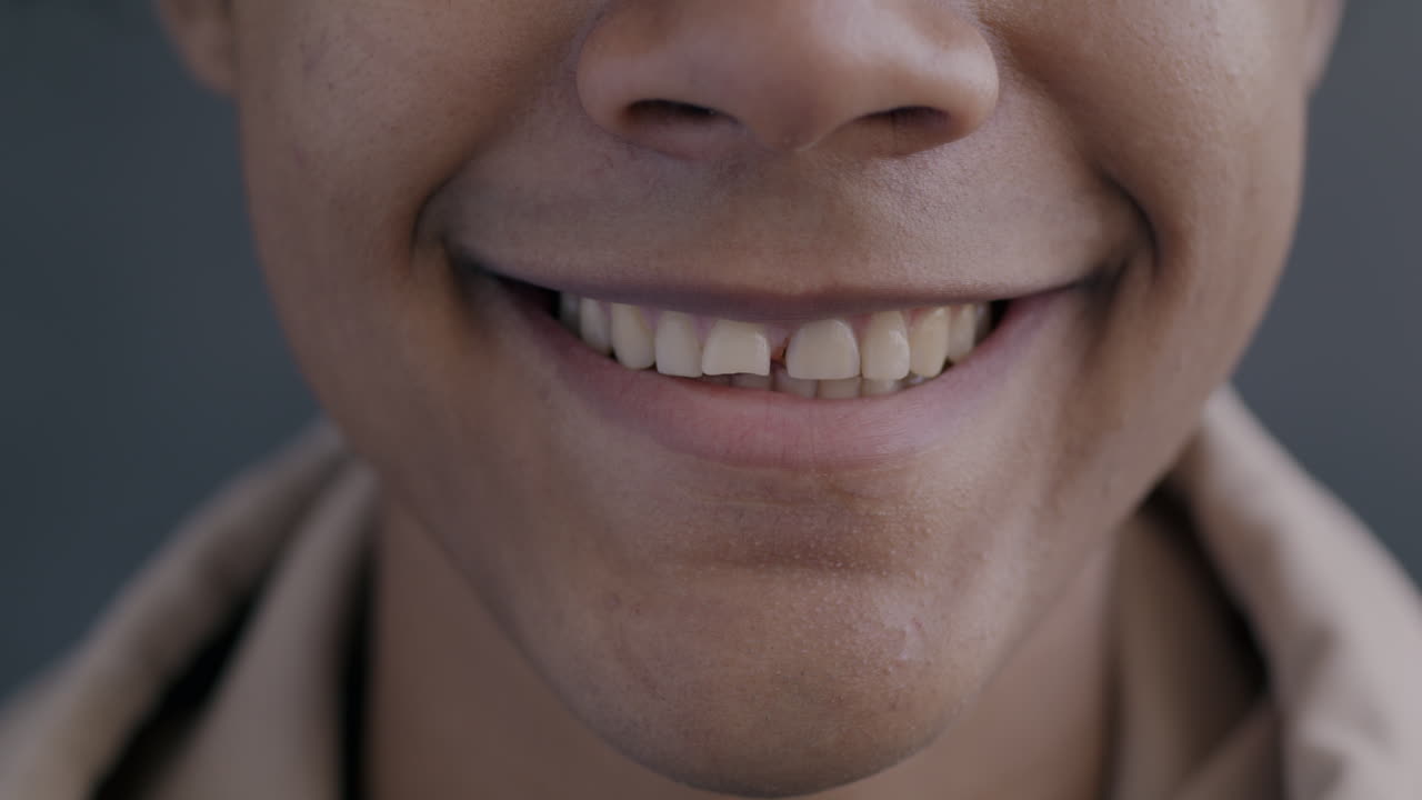 Close-up of a smiling person's face