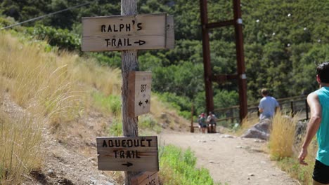 slow motion shot of a active man going running on the outdoor trails of draper city, utah