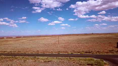 drone over the arizona desert near winslow with the i40 in the background.
