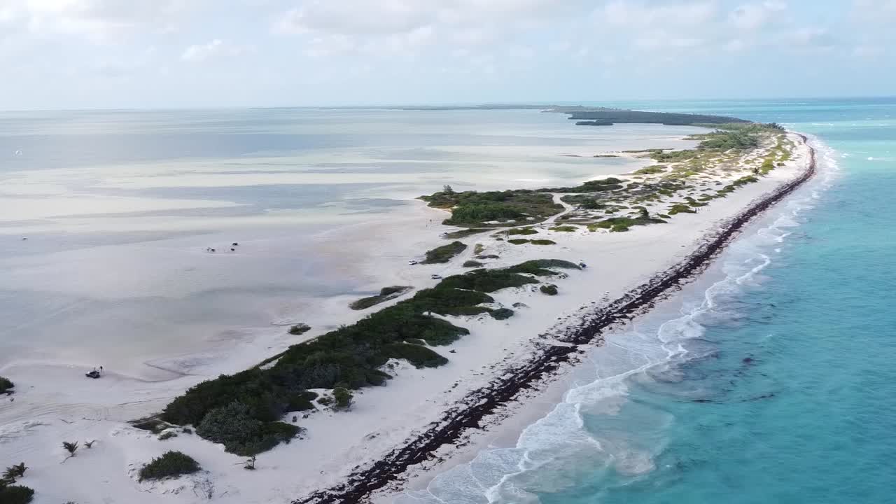 Aerial view of paradisiacal white sands of Isla Blanca beach and blue Caribbean Sea in Cancun, Mexico