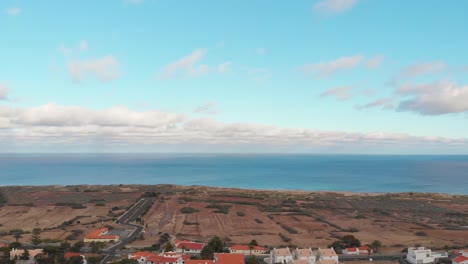 aerial dolly shot over porto santo island coastline on countryside scenery