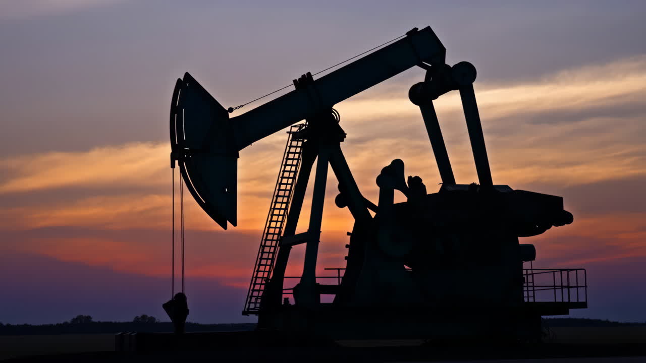 Oil Pump Silhouette at Sunset