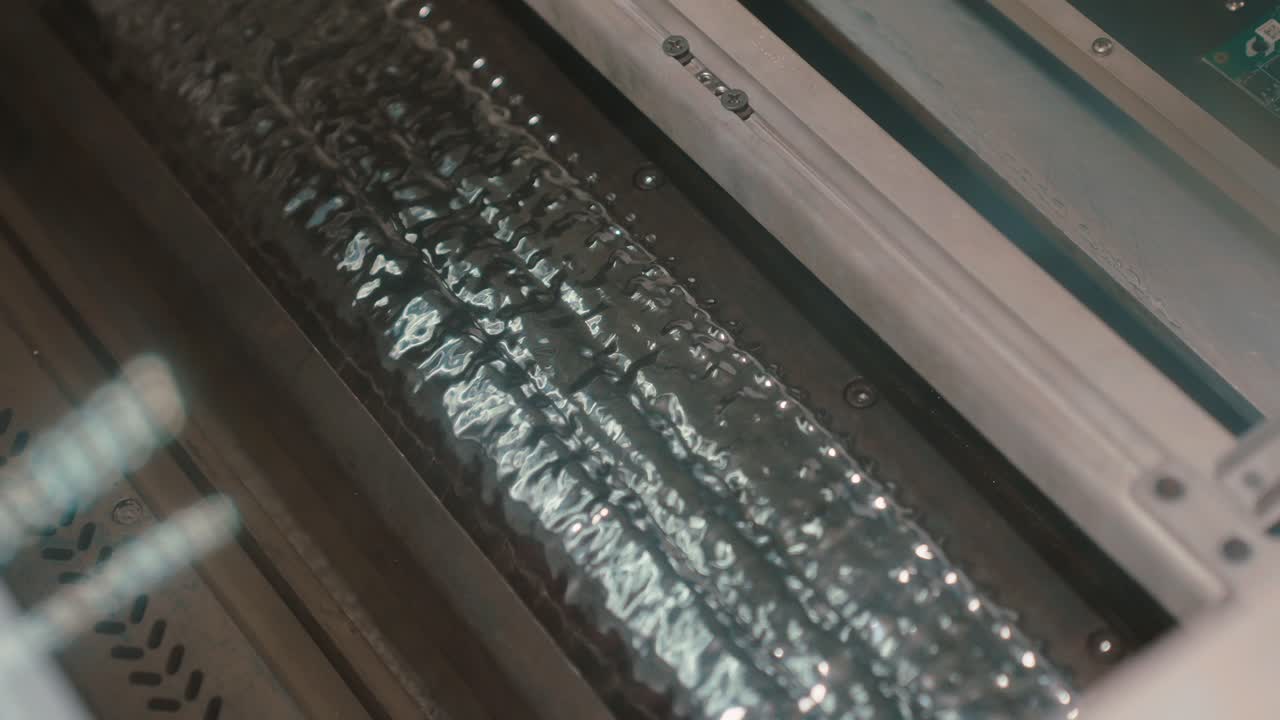 Close-up of laser cutting machine in action, slow motion, precision work