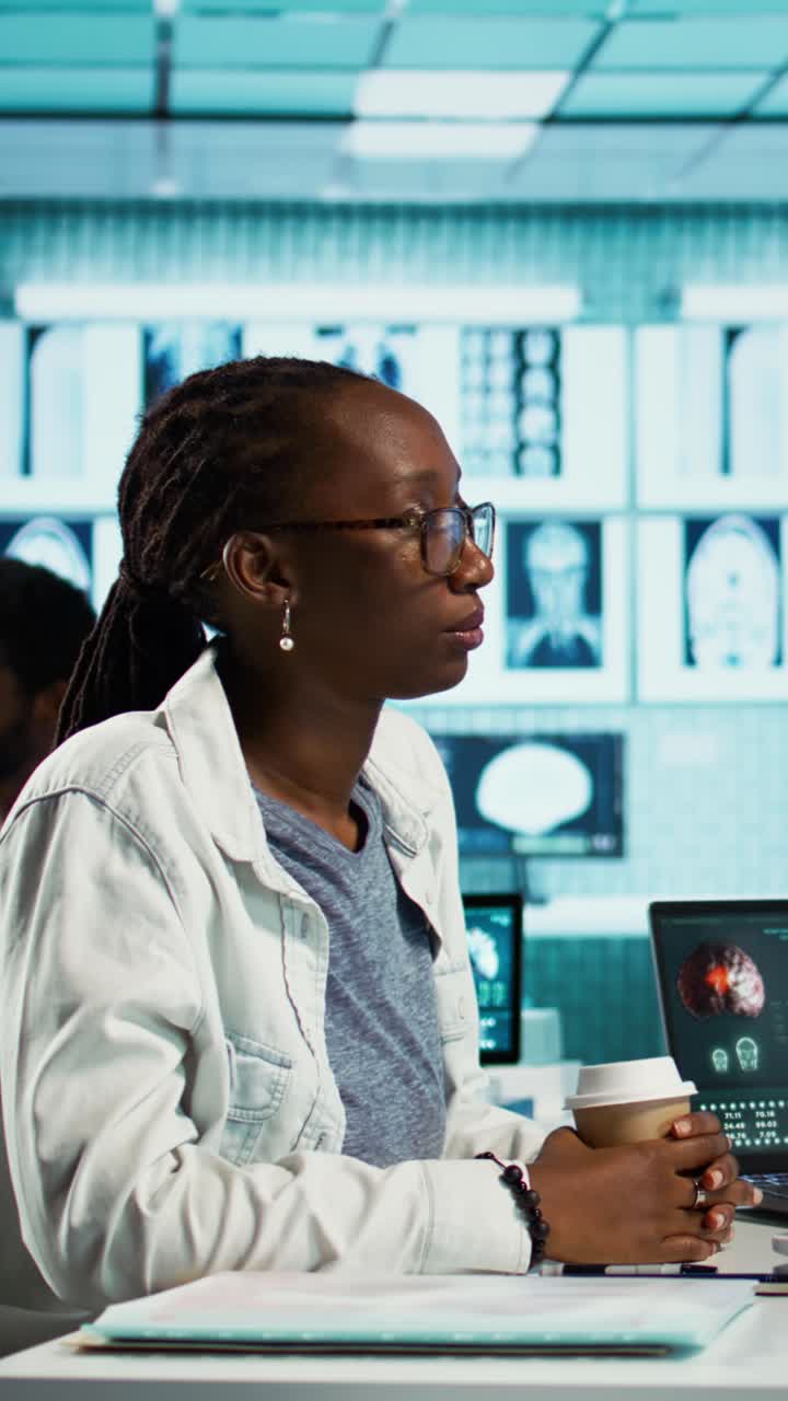 African American Woman Doctor Smiling in Medical Research Lab