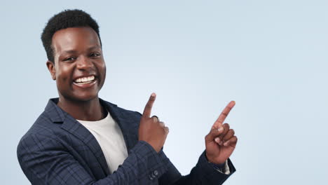 Portrait,-pointing-and-black-man-in-studio