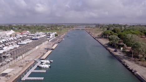 from above, you can see the water, yachts in the marina, and the city