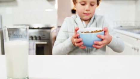 Boy-having-breakfast-in-the-kitchen