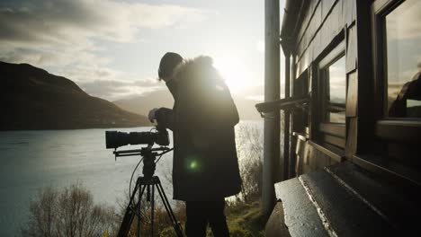 Camera-operator-at-sunrise