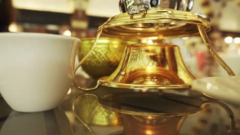 close look at the old arabian classic pot for arabic coffee made from gold