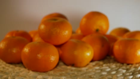 camera moving towards beautiful citrus fruit from blurry to sharp focus view