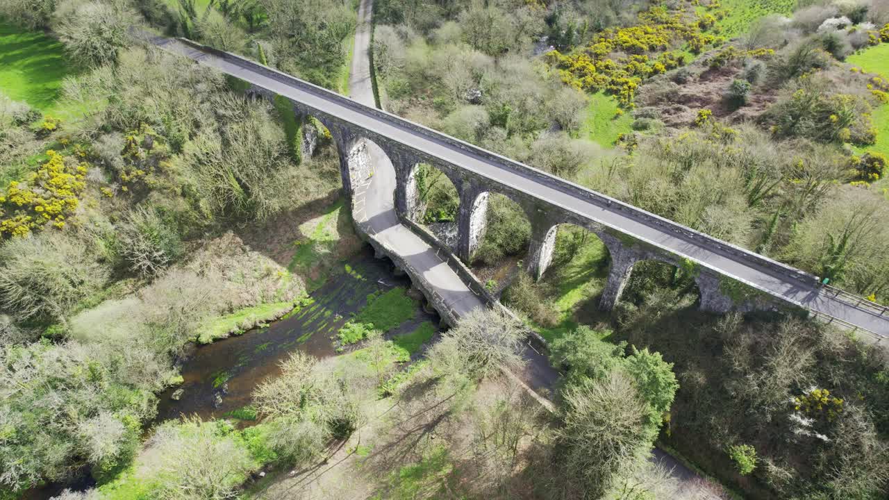Viaduct and ancient road bridge meanders under the Waterford Greenway