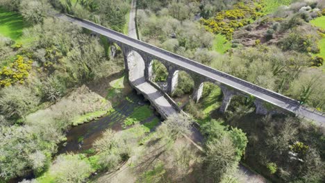 viaduct and ancient road bridge meanders under the waterford greenway