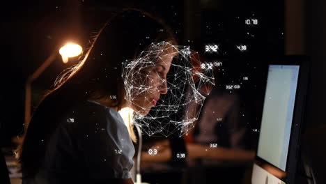 interacting with animation, woman using digital network interface in dimly lit room