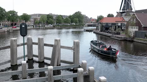 boat taxi transporting tourists on the river in the netherlands