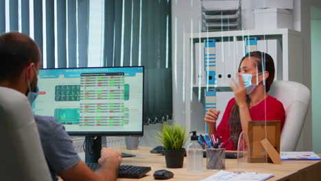 Woman-with-mask-having-online-meeting