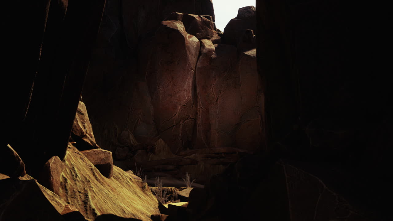 un estrecho cañón con altas formaciones rocosas a cada lado.