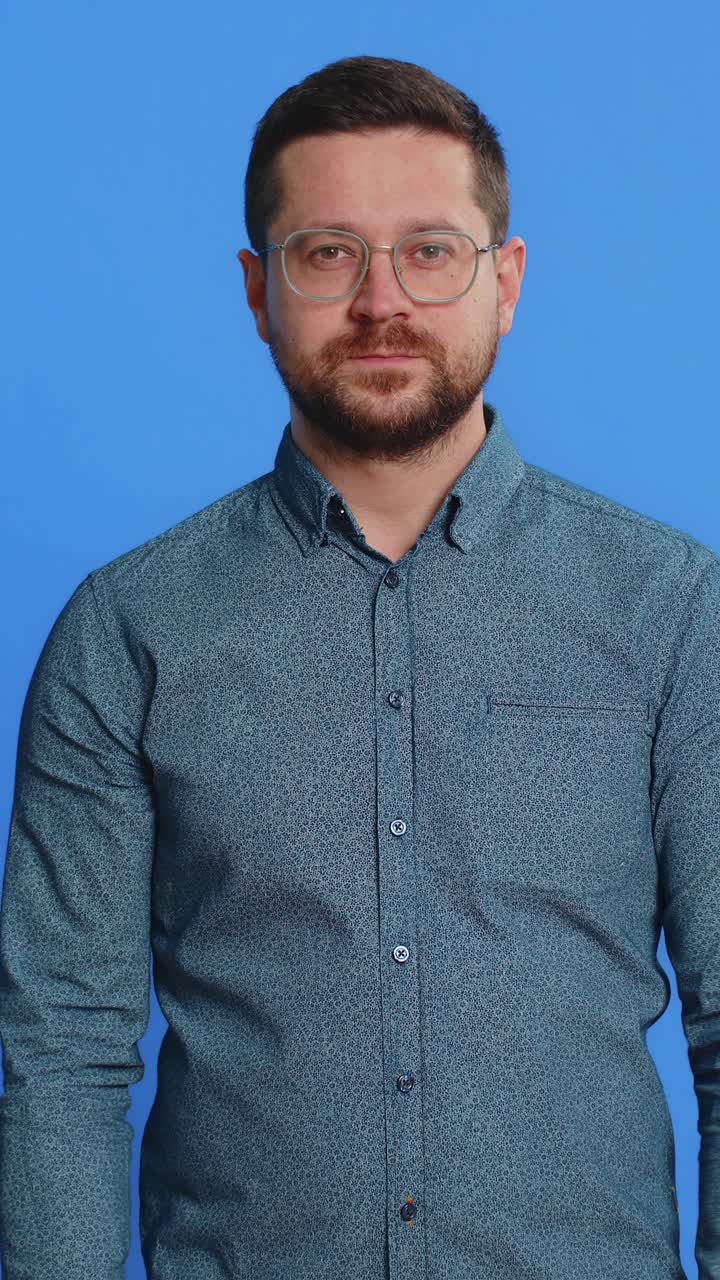 Smiling happy man pointing forward to camera choosing lucky victory winner indicating promotion