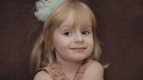 Happy-three-years-old-girl.-Cute-blonde-child.-Brown-eyes.-Cute-girl-smiling