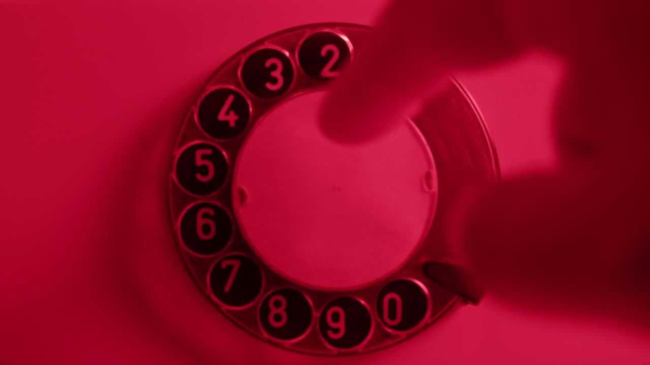 Retro vintage phone, A yellow rotary telephone is displayed on a wooden desk, adding a nostalgic touch