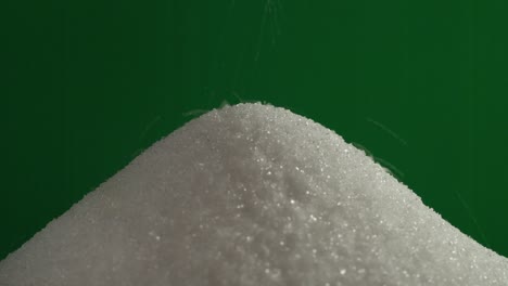 pouring sugar on green screen background