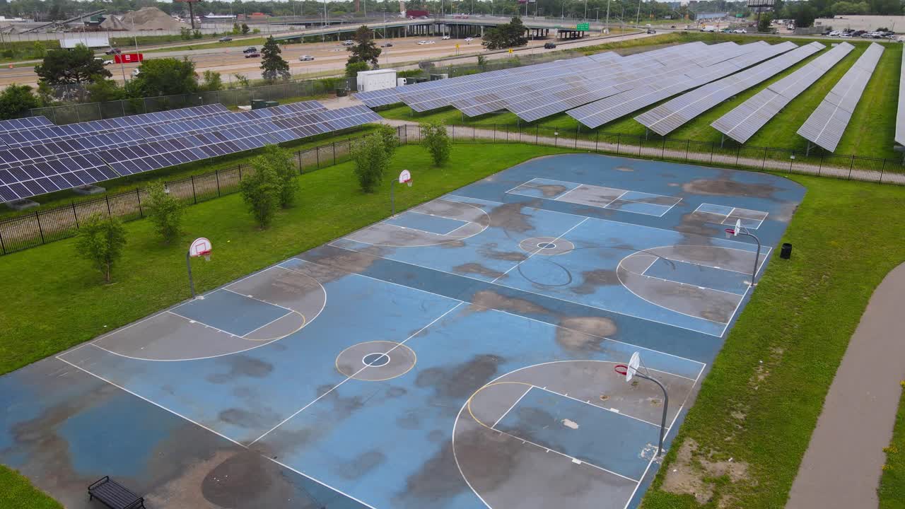 Aerial view of O'Shea Playground basketball court and Solar Farm in Plymouth neighborhood of Detroit Michigan, USA