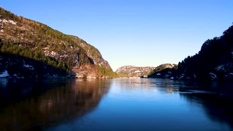 boating-in-the-fjords-surrounding-Bergen,-Norway