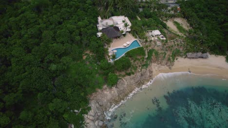 Aerial-recording-landscape-along-the-mesmerizing-coastline-in-Huatulco,-Mexico