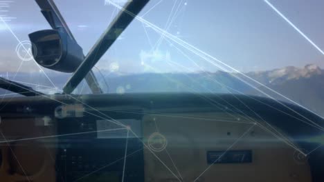 Network-of-connections-and-data-processing-against-front-view-of-dashboard-of-private-aircraft