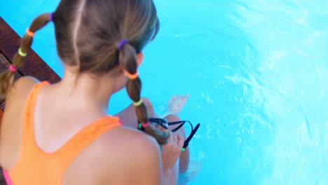 girl relaxing near poolside