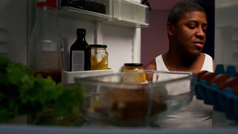 Checking the Fridge at Night