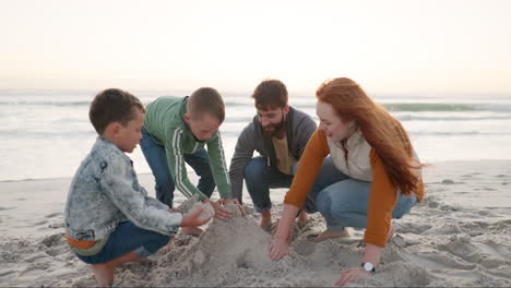Family,-building-with-sand