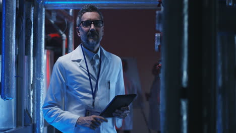 scientist inspecting industrial facility