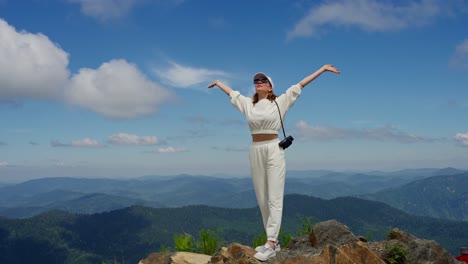 woman on a mountain summit