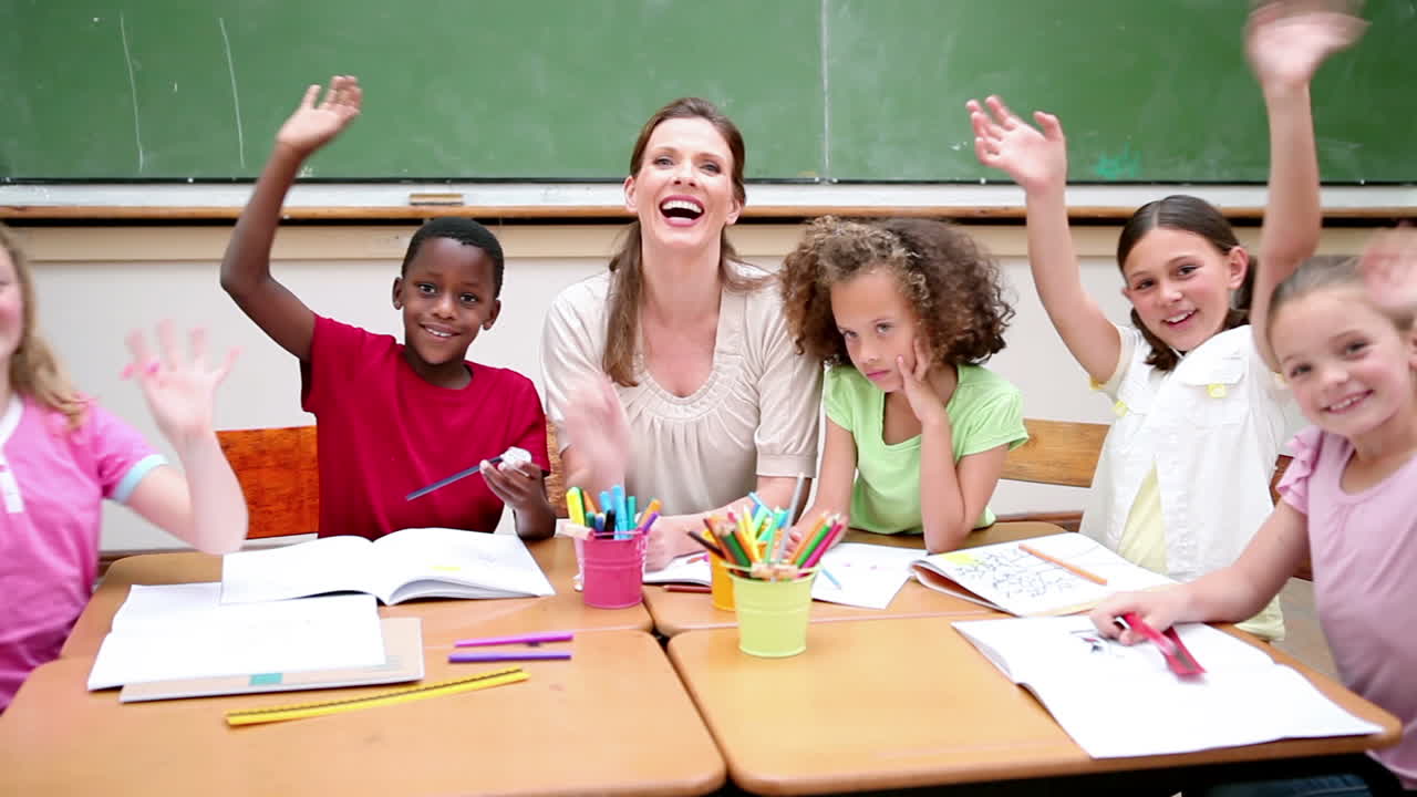 Pupils waving their hands