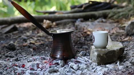 making traditional turkish coffee in camp