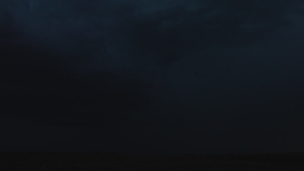 Dark Stormy Night Sky with Heavy Clouds