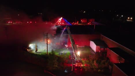 aerial view of the fire brigade extinguishing the fire in longueuil, québec