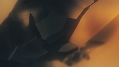 a crushed android head on a spike on the yellow background
