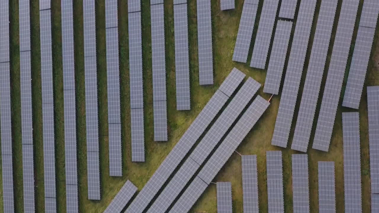 Birdseye Aerial View of Huge Solar Panels Array, Sustainable and Alternative Energy Concept, Top Down Drone Shot