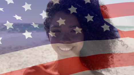 animación de un feliz hombre afroamericano sobre la bandera de los estados unidos