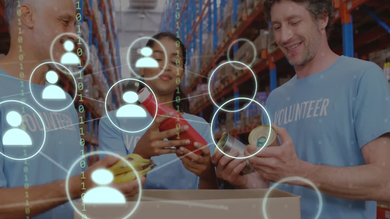 animación de una red de iconos con codificación binaria sobre diversos voluntarios en el almacén