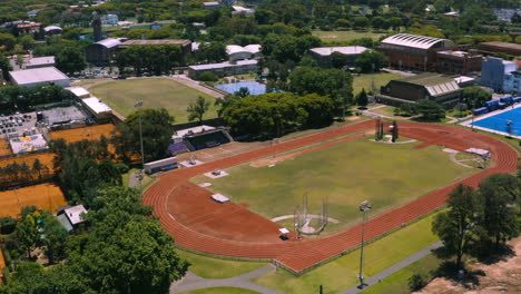 Aerial---Track-And-Field-At-Muni-Club,-Club-Ciudad-De-Buenos-Aires,-Argentina,-Circle-Pan