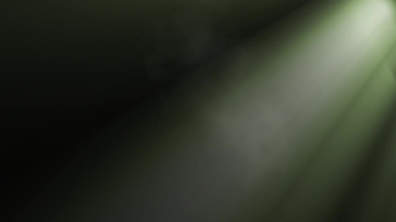 Volumetric Light Rays Moving Through Smoke on Dark Background